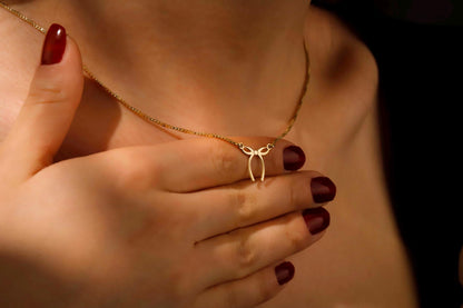 Dainty Bow Necklace by SilverGoldandRose - 14K Gold Ribbon Pendant